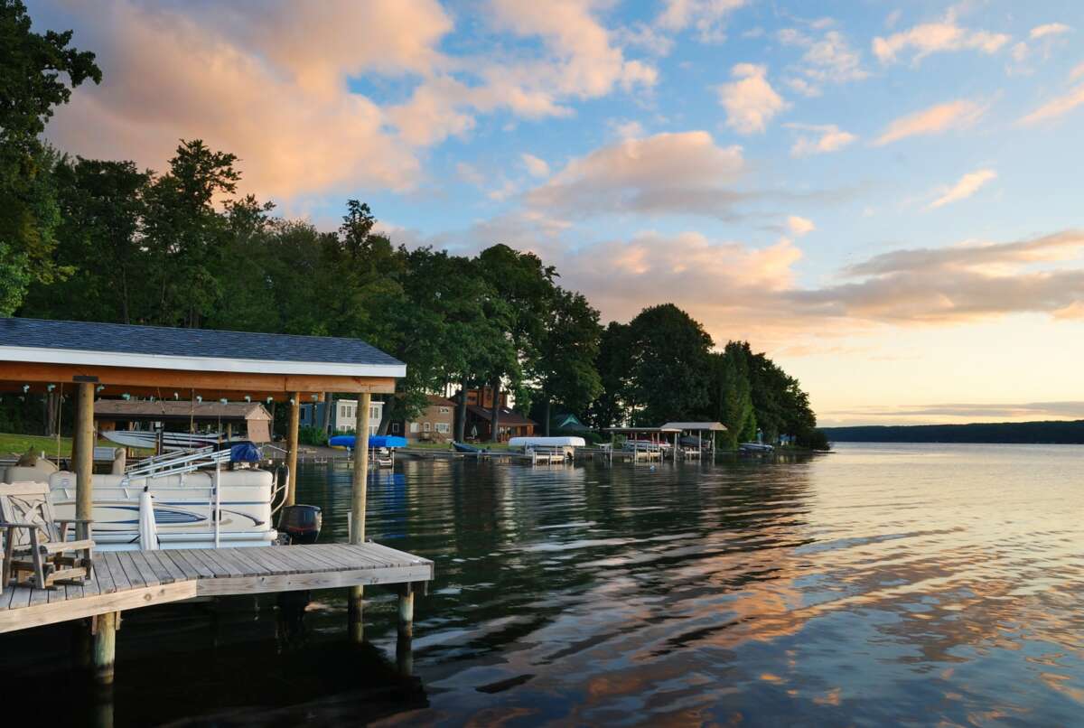 a picture of a lake front home for sale