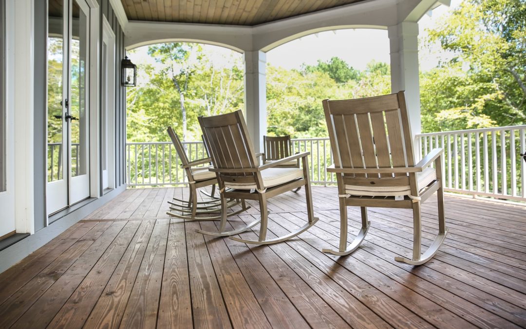 a view from a wooden porch with rocking chairs in Pendleton South Carolina.