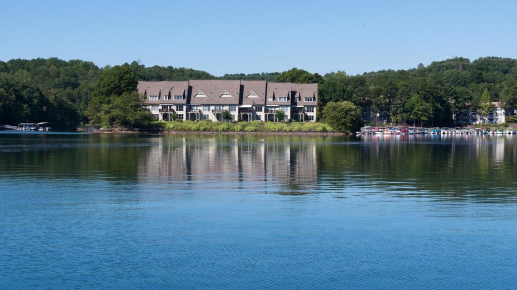 a picture of a house on a lake in Westminster, South Carolina.